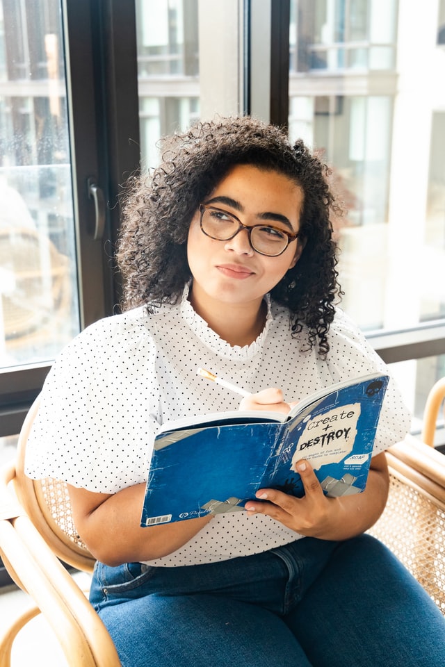 a photo of friends reading